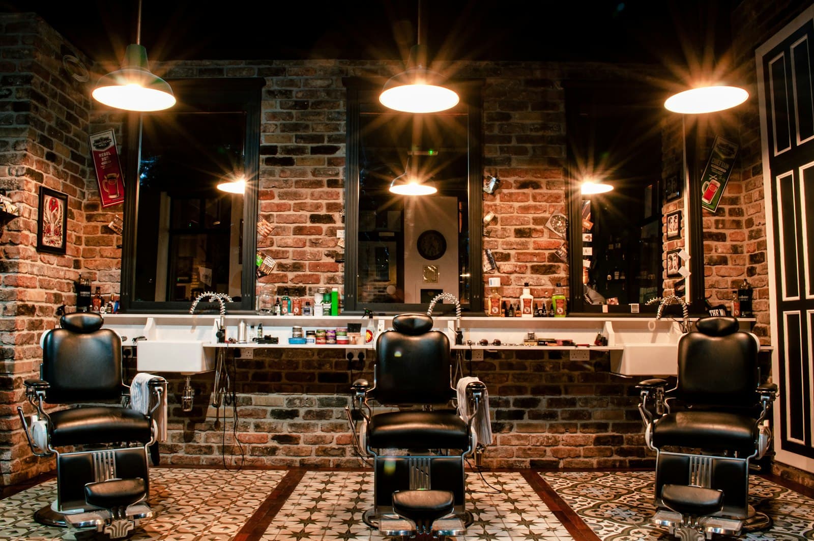 Inside Stray Dog Barbershop, three chairs on King Street North.