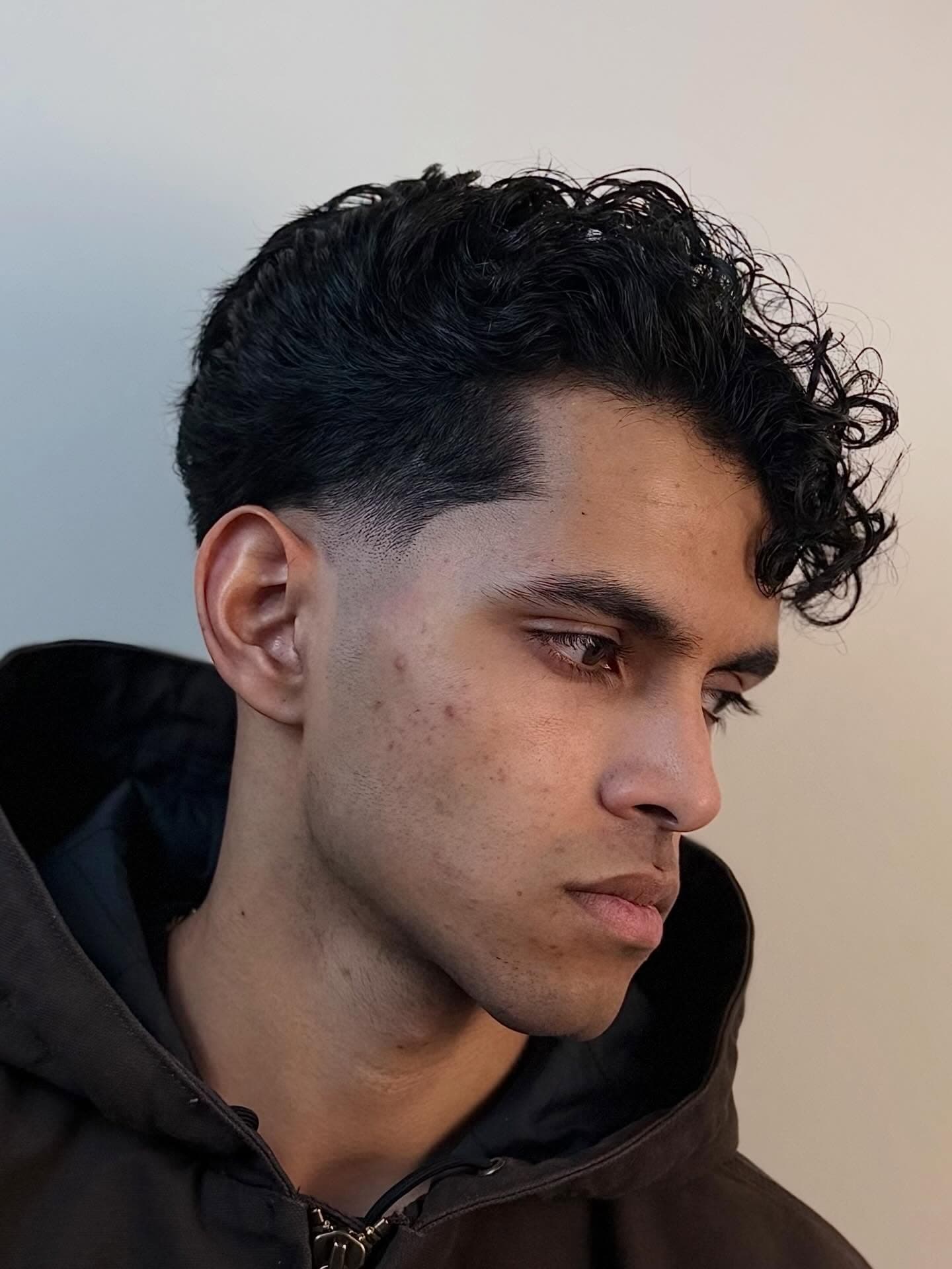 Precision scissor cut on textured hair.
